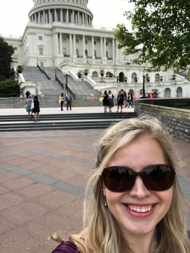 Woman in front of capitol building