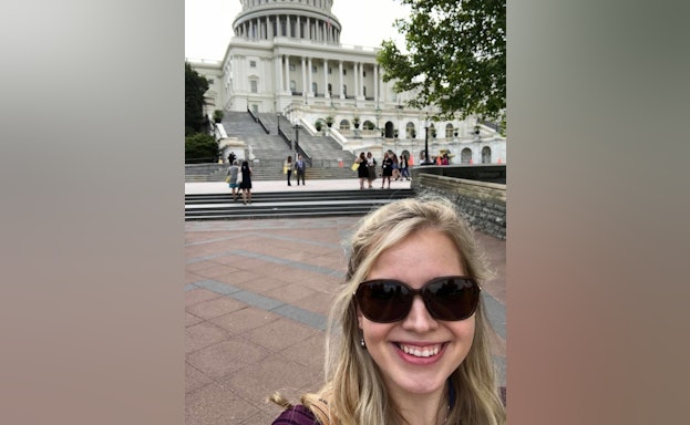 Woman in front of capitol building
