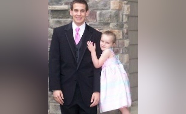 Sister hugging her brother