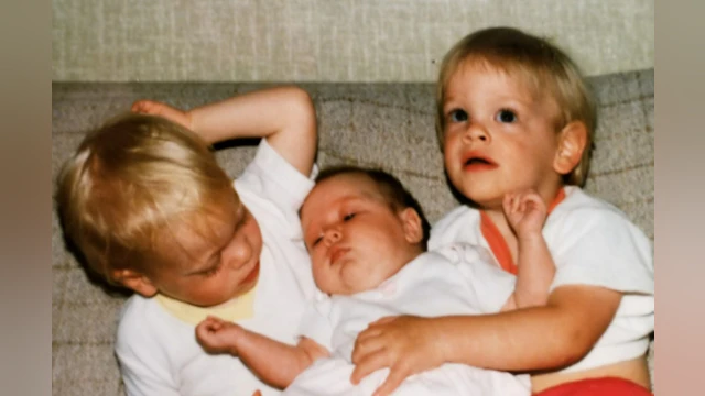 Two brothers and baby