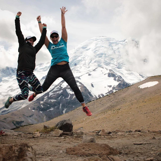 Jumping with mountains in the background
