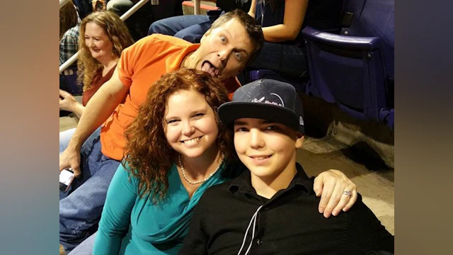 three people smiling and laughing