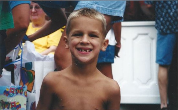 Boy looking forward and smiling