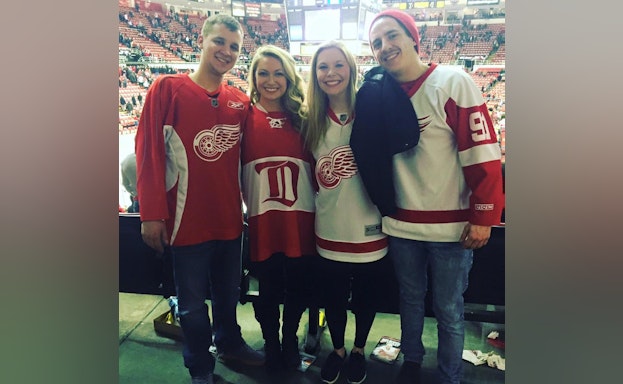 Group standing in stadium
