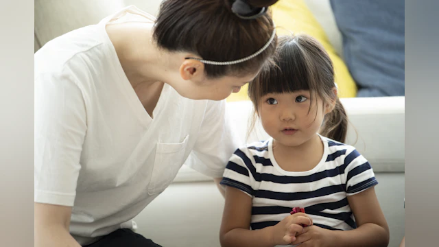 Woman and child talking