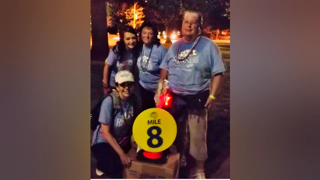 Group in front of mile marker 8