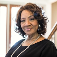Older woman smiling in home