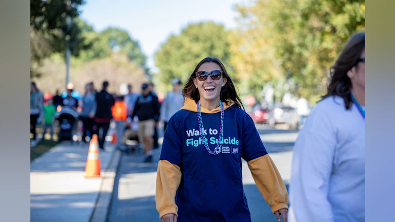 Woman smiling and walking