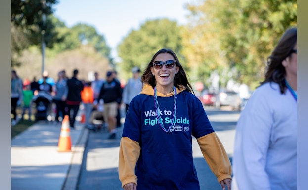 Woman smiling and walking
