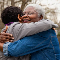 Older woman hugging