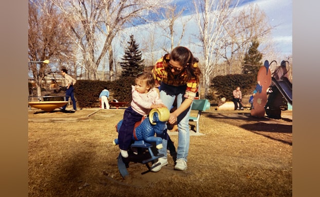 Woman and child at playground