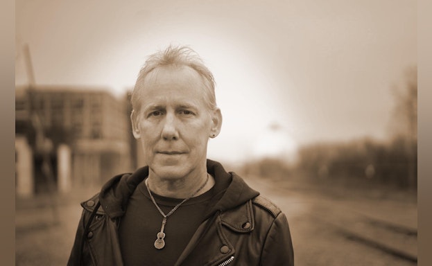 Man standing in black and white photo