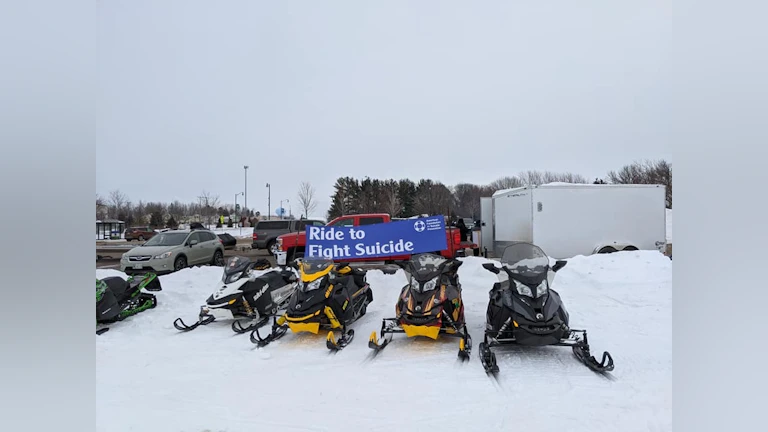 Four snowmobiles