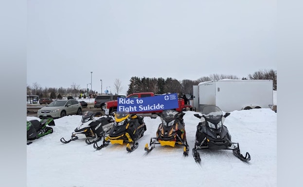 Four snowmobiles