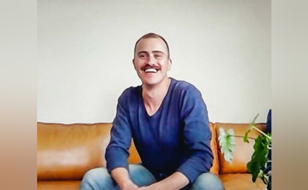 Man sitting and smiling