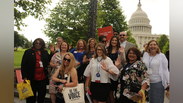 Group of advocates in front of capitol