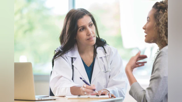 Patient talking to doctor