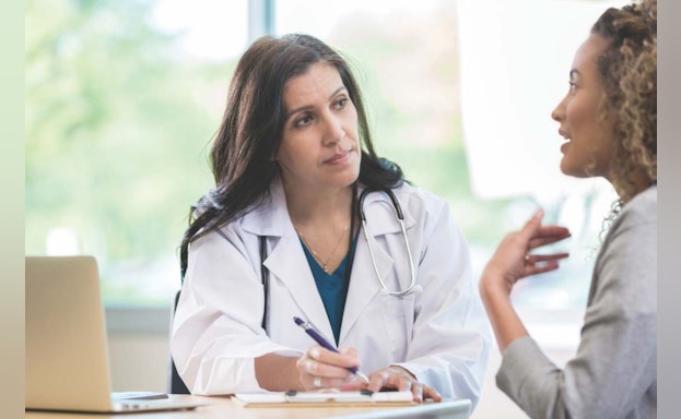 Patient talking to doctor