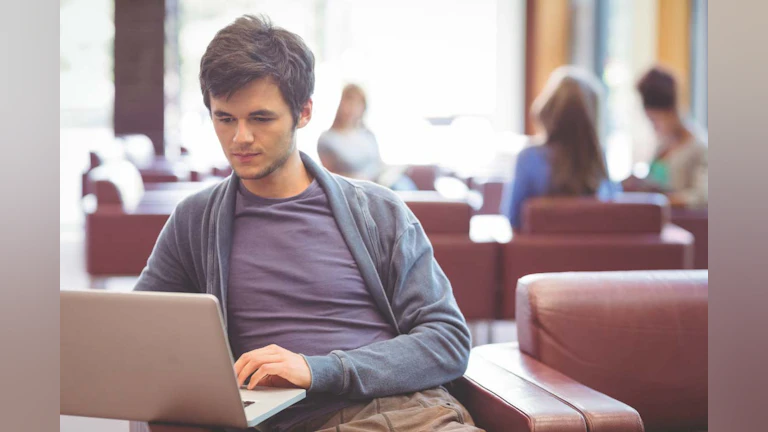 Stock image of man at computer