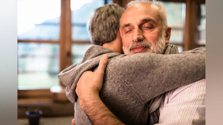 Man and woman hugging