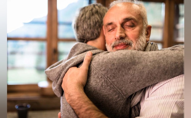 Man and woman hugging