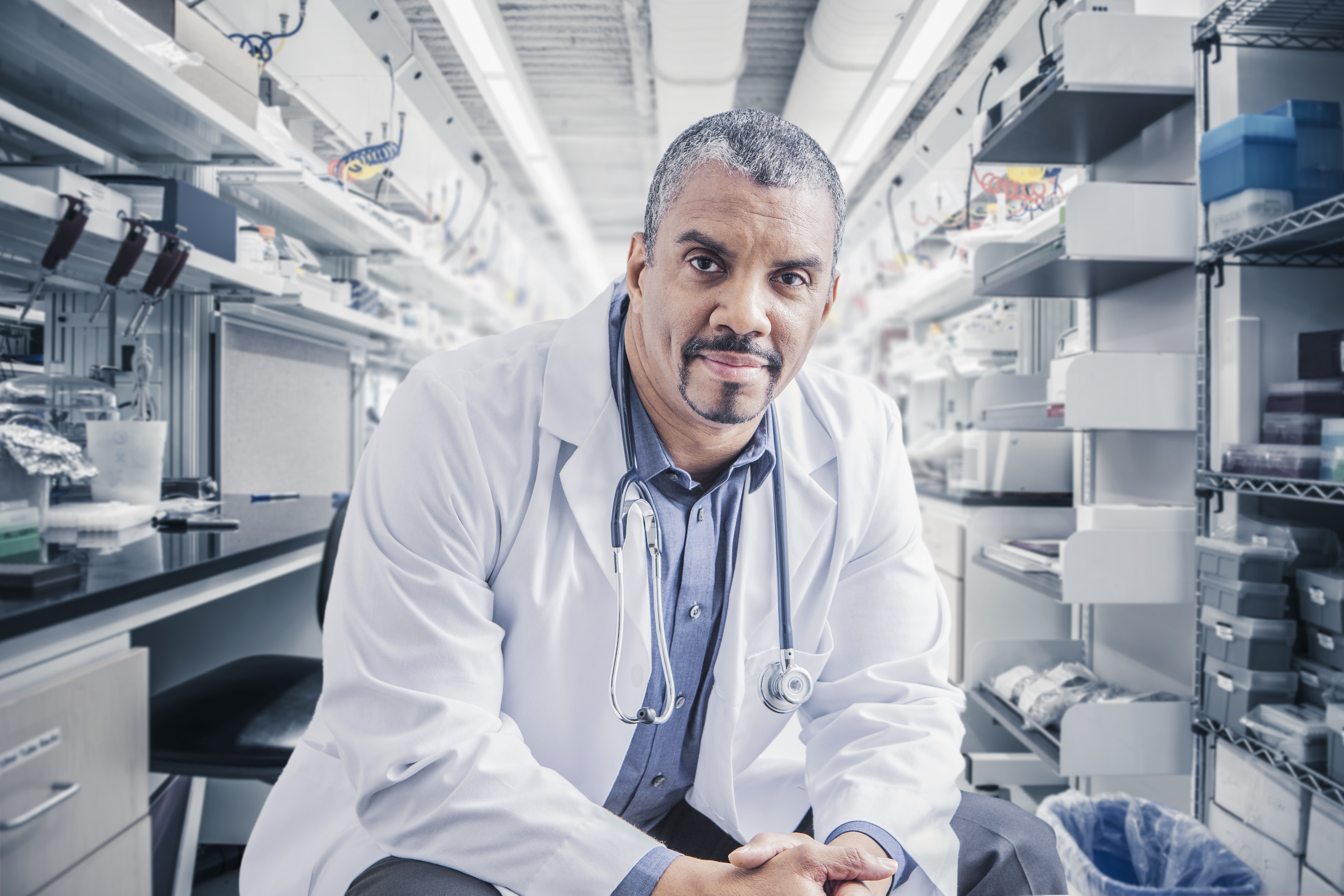 Physician sitting and facing camera