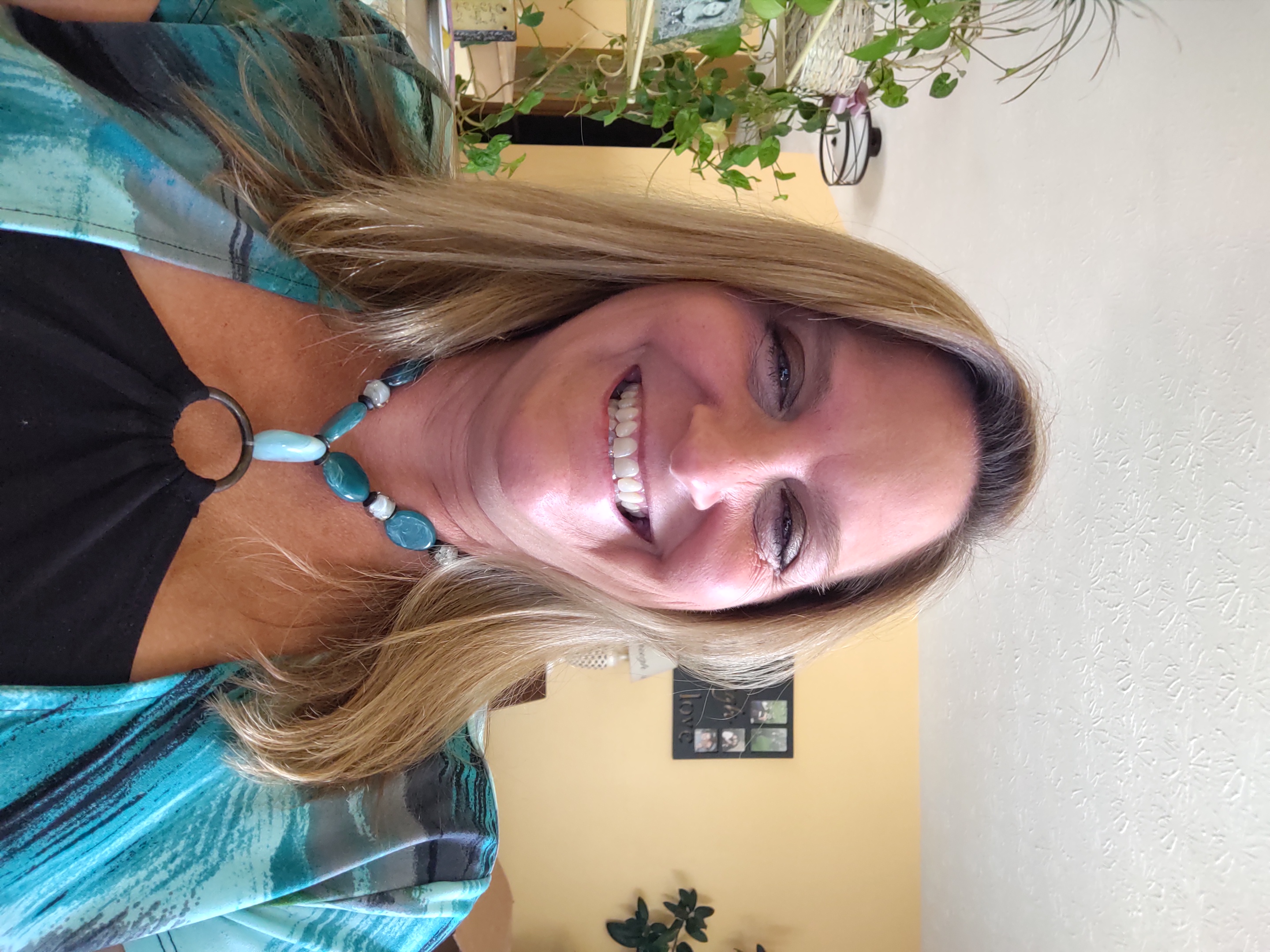 Tammy smiling indoors