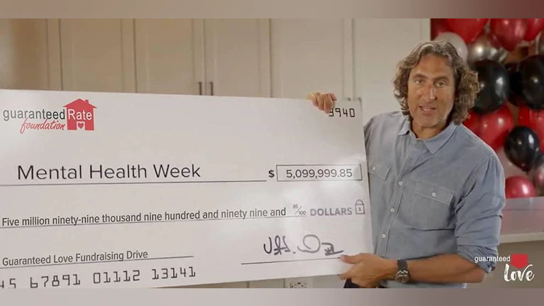 Man holding oversized check