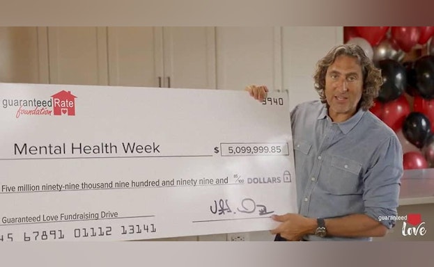 Man holding oversized check