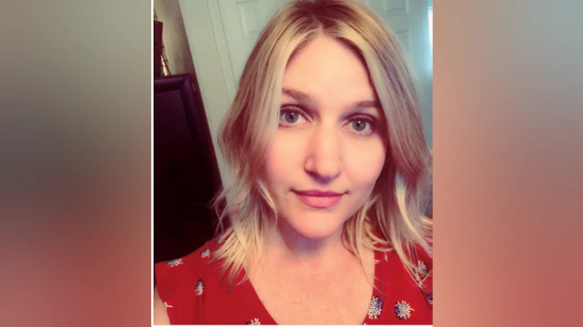 Photo of woman wearing a red blouse