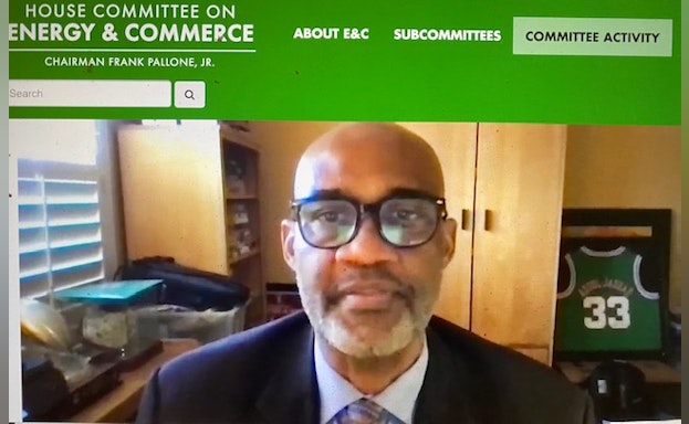 Screenshot of Chris Thomas sitting at a desk and addressing the House Committee on Energy and Commerce