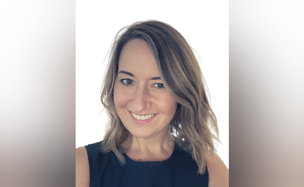 Allison smiles at the camera