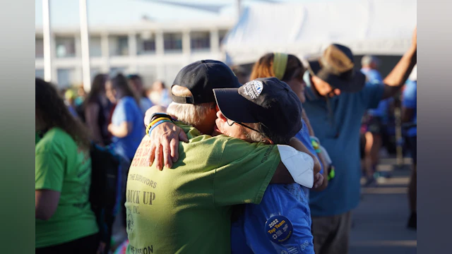 Participants hug at the Overnight