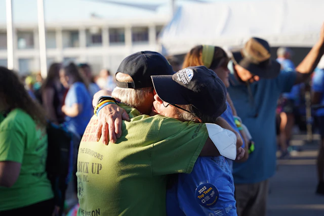 Participants hug at the Overnight