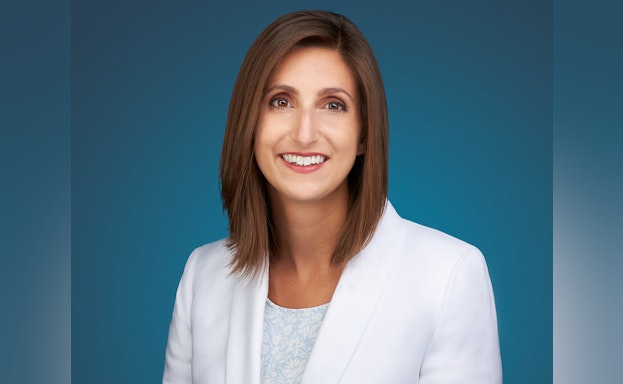 A headshot photo of Ali Walker