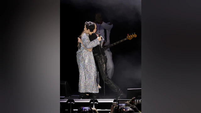 Halsey and Alanis Morsette hugging onstage
