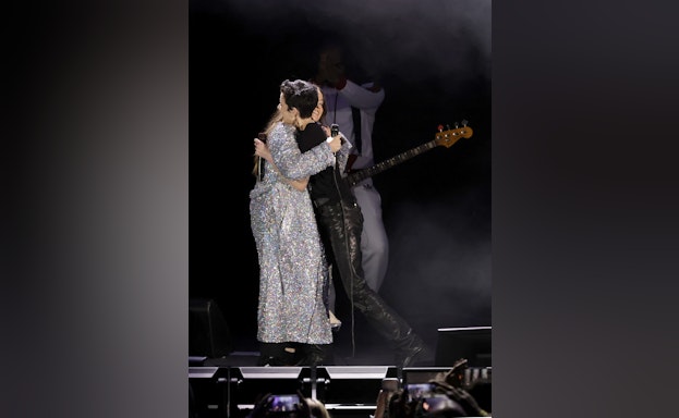 Halsey and Alanis Morsette hugging onstage