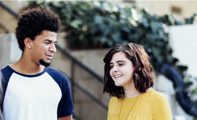 Young man and young woman talking