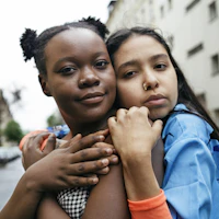 Two women hugging