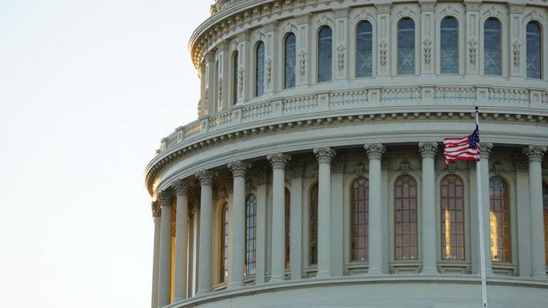 Outside of the senate building an American flag is flying