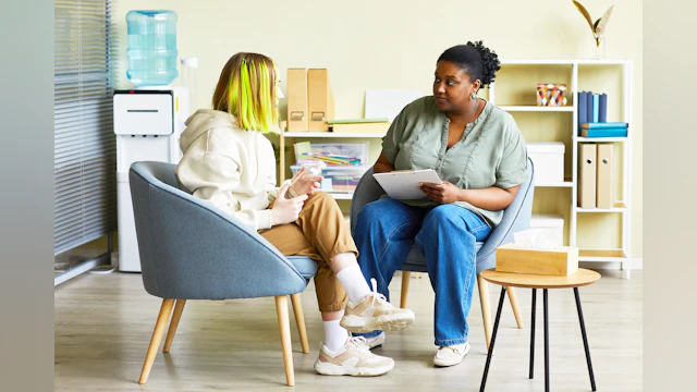 Two women talking in a counseling session