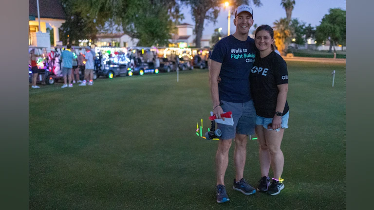 Evan Canham with his girlfriend Kelsey at the 2022 Golf for Hope event.