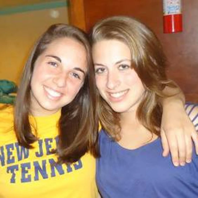 Young Tara Criscuolo smiling with Paige.
