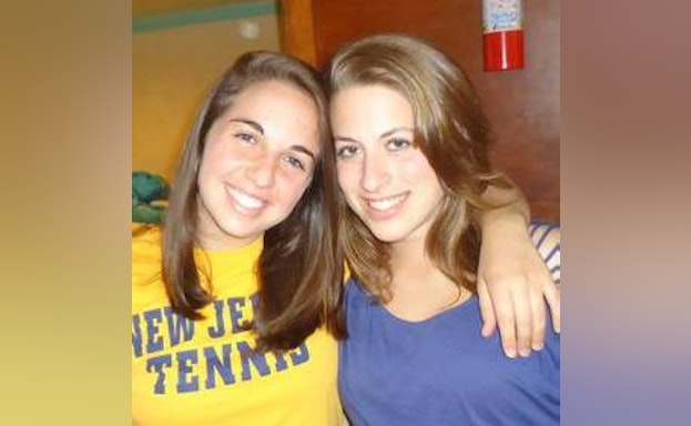 Young Tara Criscuolo smiling with Paige.