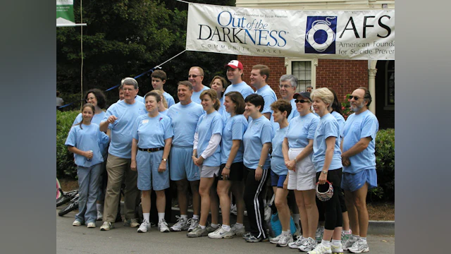 Participants gathering for a group photo at an Atlanta Out of the Darkness Community Walk