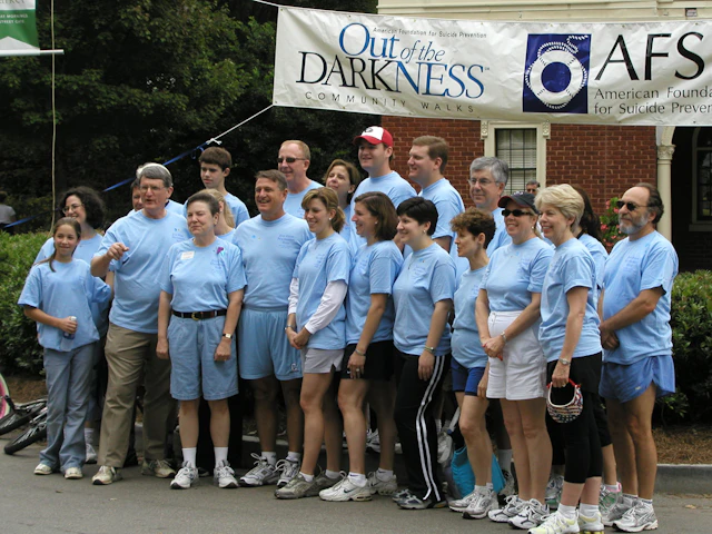 Participants gathering for a group photo at an Atlanta Out of the Darkness Community Walk
