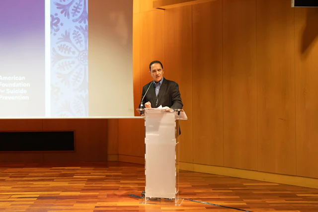 AFSP CEO Robert Gebbia deliever remarks at the International Summit on Suicide Research
