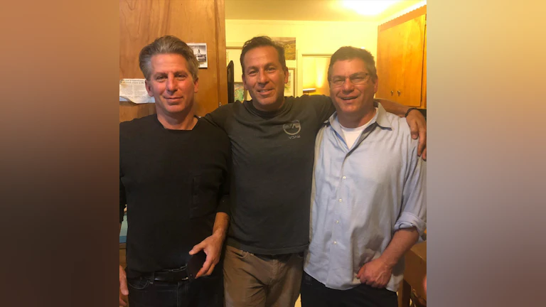 The author, Jonathan Friedman, with his brothers. His brother Gregg is on his right.