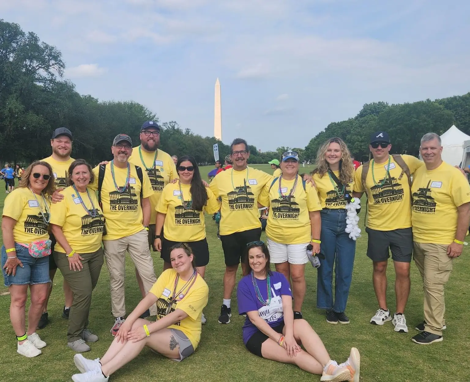 Chapter members in a group photo in front of the Washington Monument in D.C.