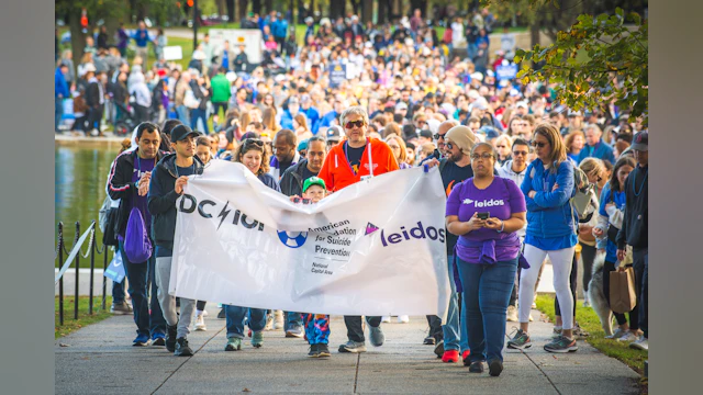 The DC101 + Leidos' One More Light team leading the 2023 Washington, D.C. Out of the Darkness Community Walk